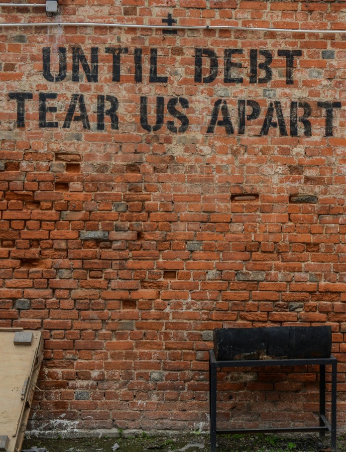 debt settlement brick wall